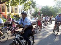 First District officers accompany children and their parents on their ride to school MPD and partner agencies work together in the community